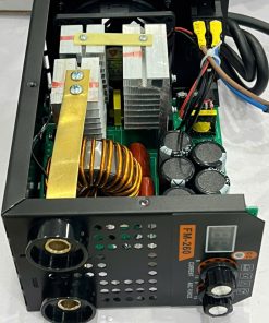 Open-power supply with heat sinks, large copper coil, capacitors, and wiring inside a metal chassis.